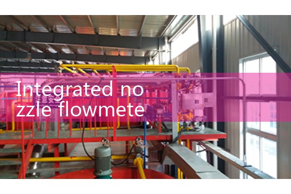 Integrated nozzle flowmeter